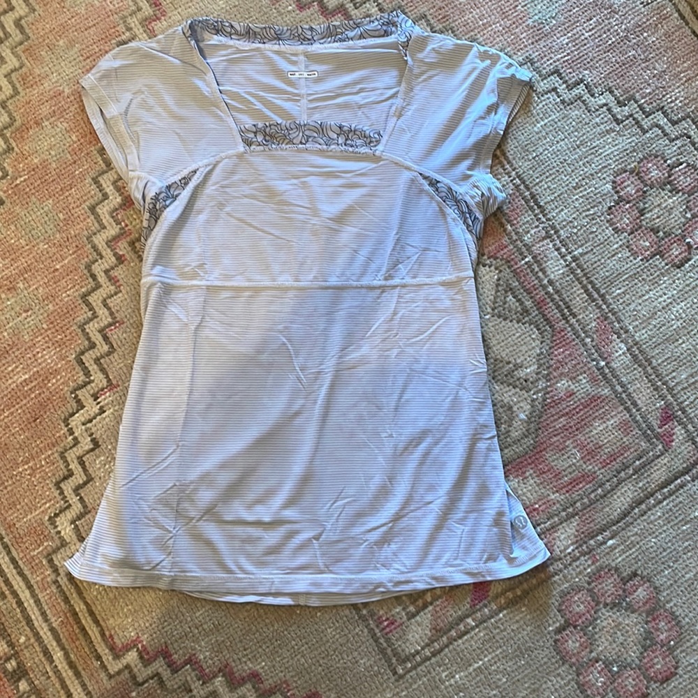Lululemon white and black striped cap sleeve shirt with floral mesh details